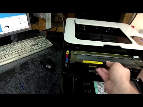 Видео: Samsung CLP_CLX | Замените установите контейнер для сбора тонера