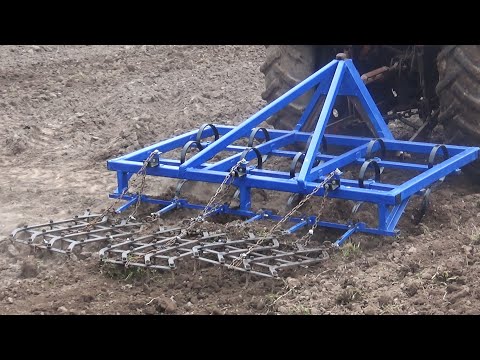 Видео: ИСПЫТАНИЯ НАВЕСНОГО КУЛЬТИВАТОРА НА ТРАКТОРЕ Т-40