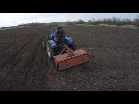 Видео: Фрезеруем огород под овощи на минитракторе  Синтай 220