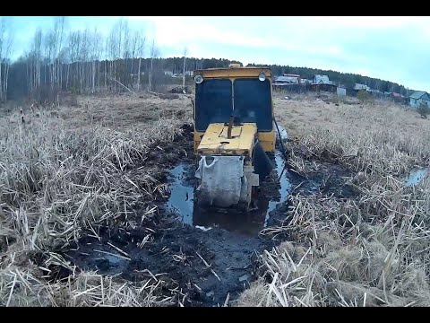 Видео: бульдозер прокладка кабеля в труднодоступных местах