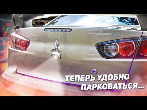 Видео: Установка штатной камеры заднего вида на Mitsubishi Лансер 10