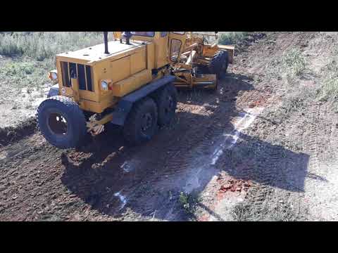 Видео: Работа автогрейдера ДЗ-143