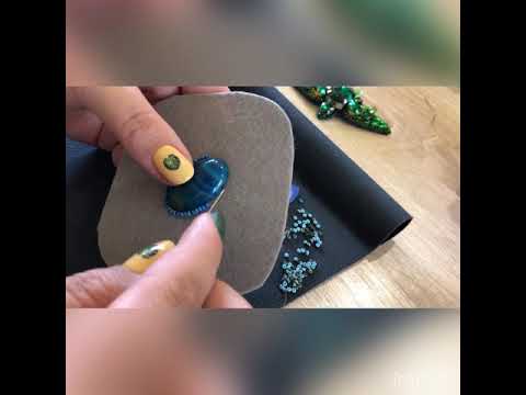 Видео: Как оплести кабошон из натурального камня бисером