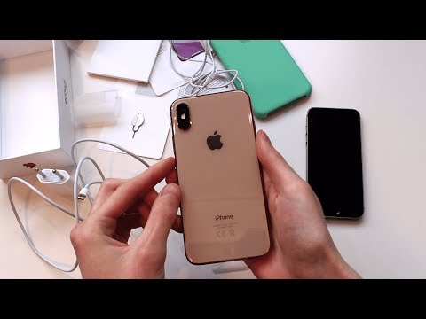 Видео: Распаковка Apple iPhone XS 64GB Gold