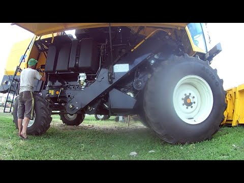 Видео: Комбайн New Holland tc5.90 после 2 лет службы, полная смазка,проверка натяжки цепей и ремней