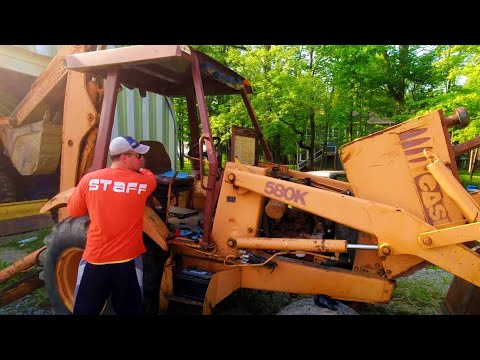 Видео: Техническое обслуживание экскаватора-погрузчика Case 580K: масло, топливо и трансмиссия