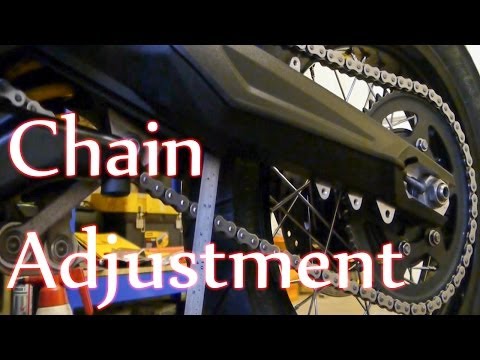 Видео: Tiger 800 — Чистка, регулировка и смазка цепи