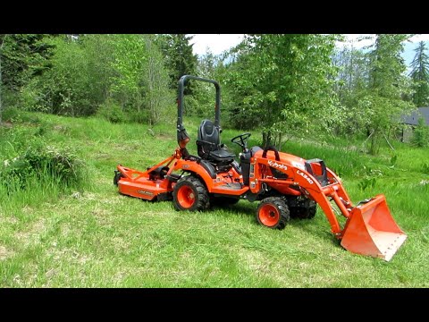 Видео: Как снять обратную лопату с Kubota BX23S - Установите Bush Hog или заднюю режущую деку на BX23S.