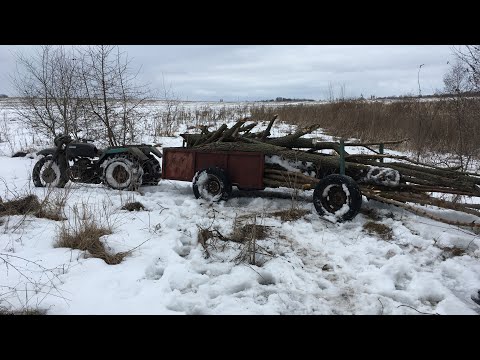 Видео: Заготівля дров , MotoTRUCK К-750 M на колісних ланцюгах  , лебідка виручає .