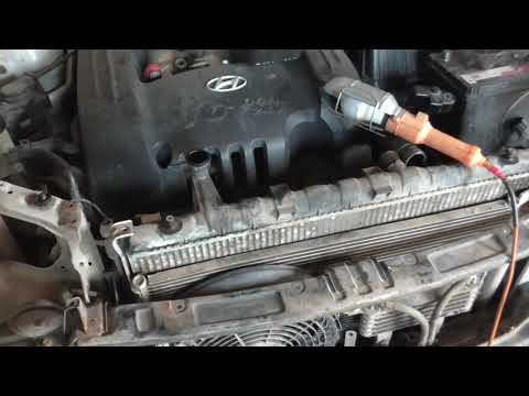 Видео: Замена радиатора на SantaFe 02г.