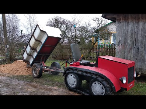 Видео: Гусеничный минитрактор испытания прицепа на грузоподъёмность