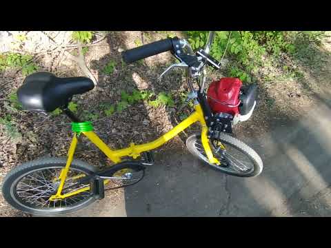 Видео: Переднеприводный бензовелосипед с мотором от косы
