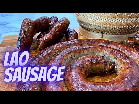 Видео: Как приготовить ЛАОССКУЮ СВИНУЮ КОЛБАСУ | Sai Oua | ДОМАШНИЙ САЙ ГОК | ສາການ | ОСТРЫЕ И НЕОСТРЫЕ