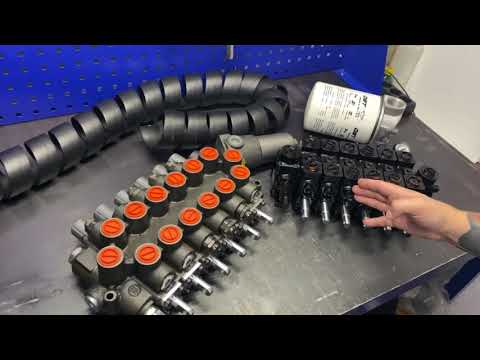 Видео: Гидрораспределитель манипулятора. Замена RM316. Болгарский Р140 под тяги - обзор