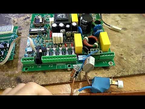 Видео: Магнус 21 ошибка E0 - неисправен Процессор  PIC18F2431