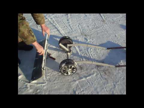 Видео: Лопата на колесах для чистки снега (скребок).