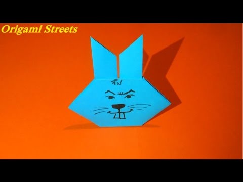 Видео: Как сделать зайца из бумаги. Оригами заяц из бумаги