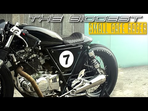 Видео: Cafe Racer (SUZUKI GN250, построенный Solace Motorcycle)