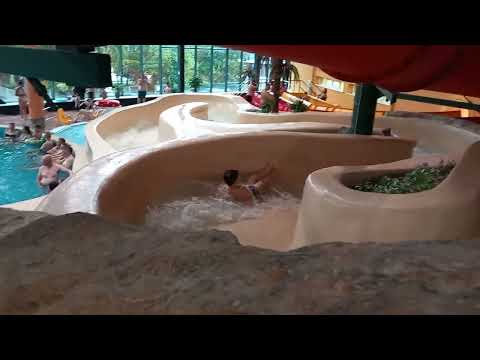 Видео: Ūdens piedzīvojumu parks Ventspils Latvia. Аквапарк в Вентспилсе полный обзор СПА водные аттракционы