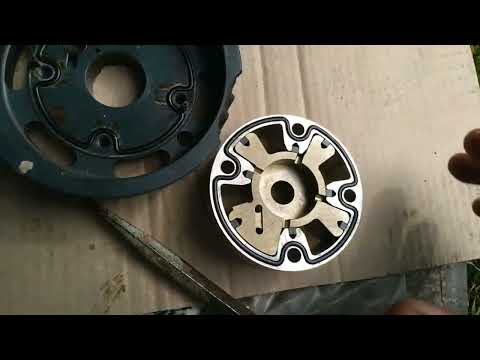 Видео: N 1 Рено Меган 2 1.6 16кл замена сальника (с пружиной) фазорегулятора и ремонт фазорегулятора.