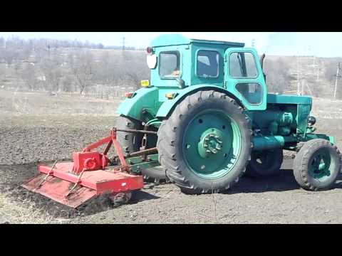 Видео: Т-40 с почвофрезой