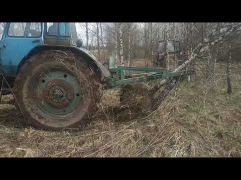 Видео: раскорчевка полей мтз 82.