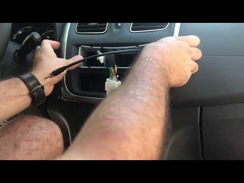 Видео: Установка магнитофона Рено Логан 2