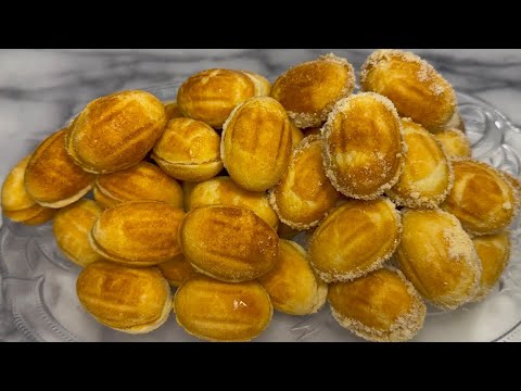 Видео: Συνταγή για τα πιο νόστιμα και τραγανά Καρυδάκια. Cookies with caramel. Орешки со сгущенкой.