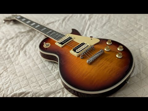 Видео: Реплика Gibson Les Paul Custom с OZON