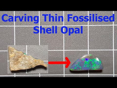 Видео: Как вырезать из тонкого окаменелого ракушечного опала тёмный опал Кубер-Педи с помощью дремеля/вр...