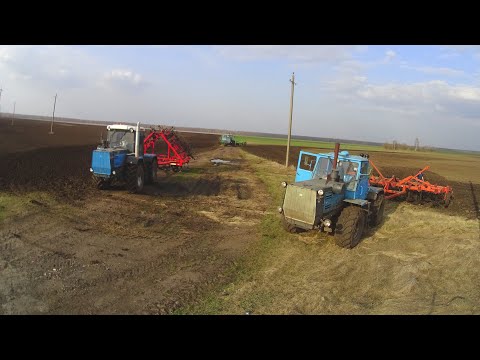 Видео: Начало сева гороха и культивация под его сев на тракторах ХТЗ.