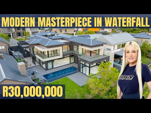 Видео: 30 000 000 рандов | Современный особняк в Гринбелте | Загородное поместье у водопада | Роскошная ...