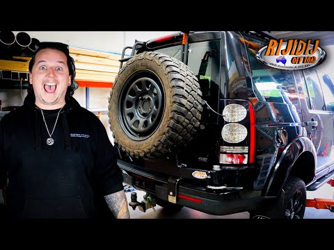 Видео: Установка держателя запасного колеса — Land Rover Discovery 4