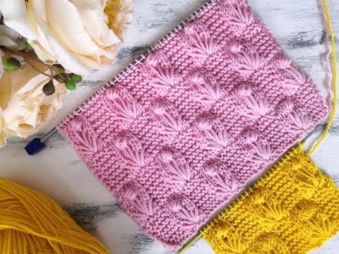 Видео: Красивый рельефный узор "Цветы с шишечками" для вязания спицами .