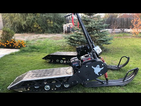 Видео: Снегокат фАНТОМ!!! Полный обзор,от разгрузки с легкового авто, до сборки с запуском