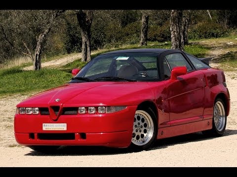 Видео: Alfa Romeo SZ ES-30 - за рулем Давиде Чирони