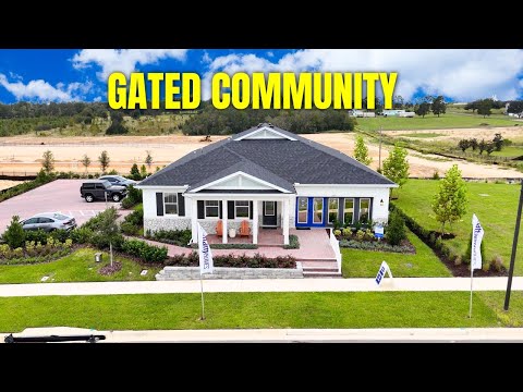 Видео: Внутри двух новых домов, выставленных на продажу в закрытом жилом комплексе в Орландо, Флорида