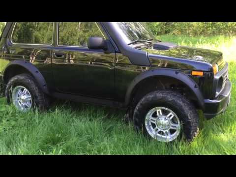 Видео: Нива Урбан тюнинг, установка расширителей lapter, шноркель, лифт.