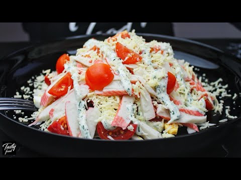 Видео: Простой рецепт воздушного салата с крабовыми палочками на праздник!
