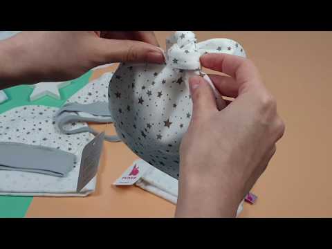 Видео: Шапочки для новорожденных - какую выбрать? Чепчик, с узелком, или с ушками?