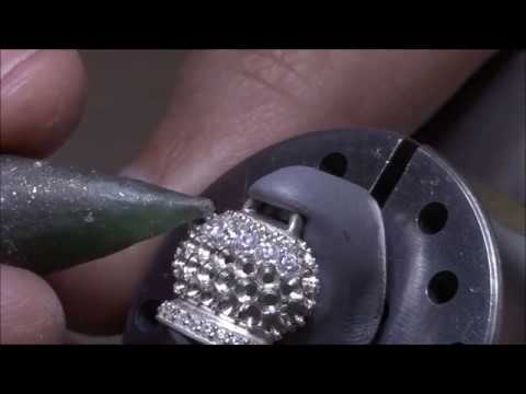 Видео: Закрепка камней Stone setting (серьги)