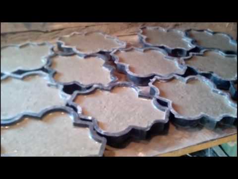 Видео: Изготовление тротуарной плитки (часть1)