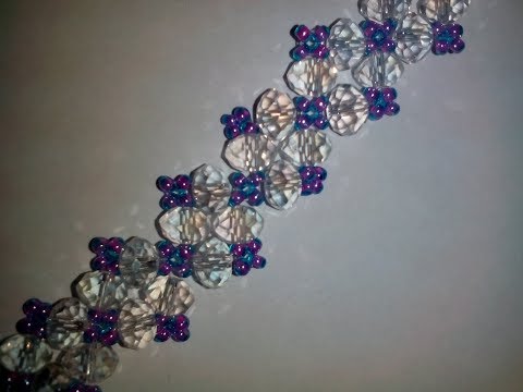 Видео: Браслет из бисера и бусин. Tutorial: beaded bracelet