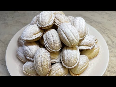 Видео: ПЕЧЕНЬЕ ОРЕШКИ ИЗ ДЕТСТВА! Орешки со сгущенкой! Легко и вкусно!