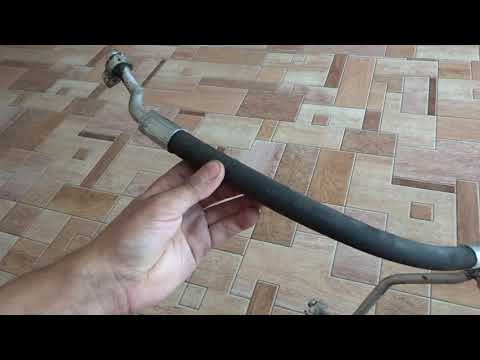 Видео: Замена шланга кондиционера на Mazda Demio.