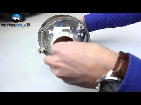 Видео: Установка би-ксенон линзы H1 в фару VW Golf 5. AUTOZS.RU