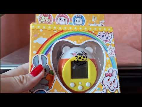 Видео: Обзор на тамагочи Qpet.