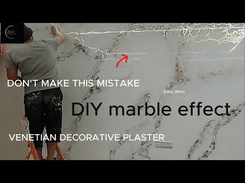 Видео: Венецианская декоративная штукатурка белая с золотом.