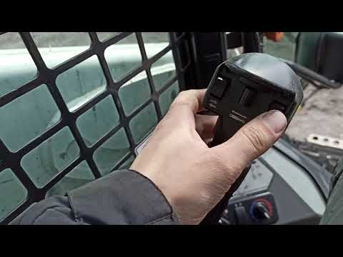 Видео: Bobcat мини погрузчик в кабине
