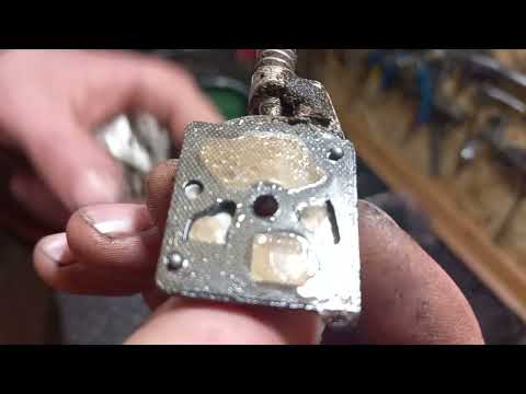 Видео: Бензопилка Китпром - глохне якщо направити шину до землі